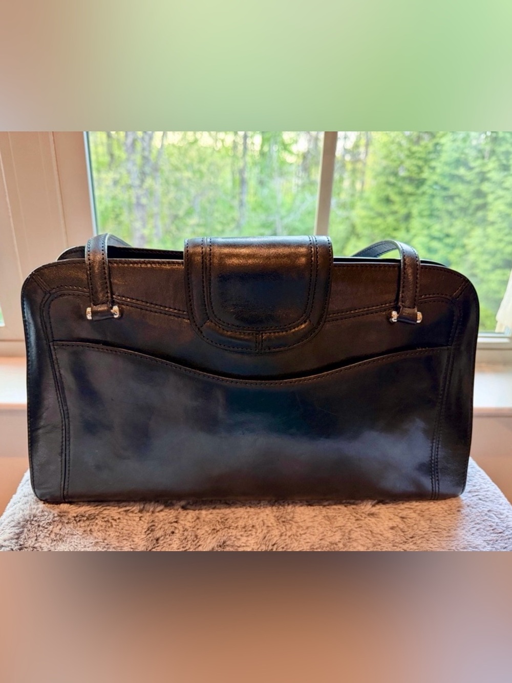 Women’s classic black Monsac shoulder bag. Minimal silver hardware.